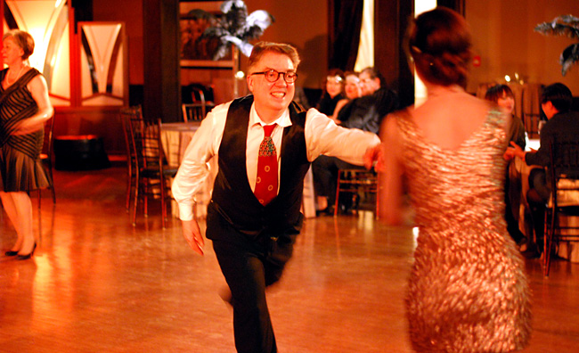 Lindy hoppers doing their thing on the dance floor.