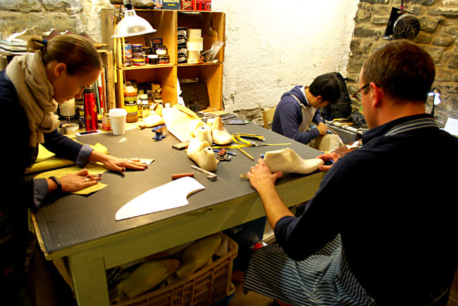 Peter Feeney and his cordwainers working on custom shoes.